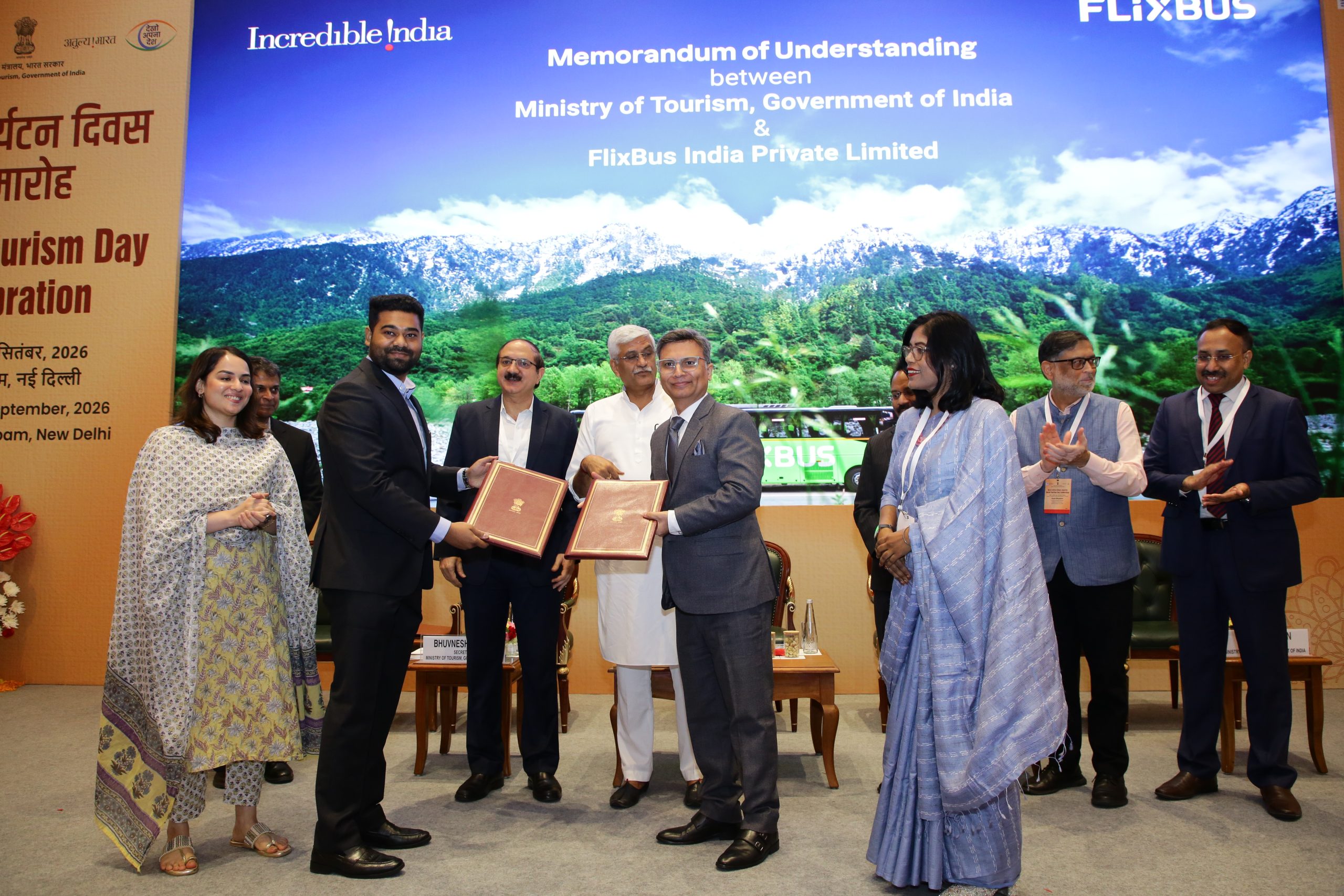 Flix India leads posing with Government of India ministers and secretaries, holding the Memorandum of Understanding between the Ministry of Tourism and FlixBus India